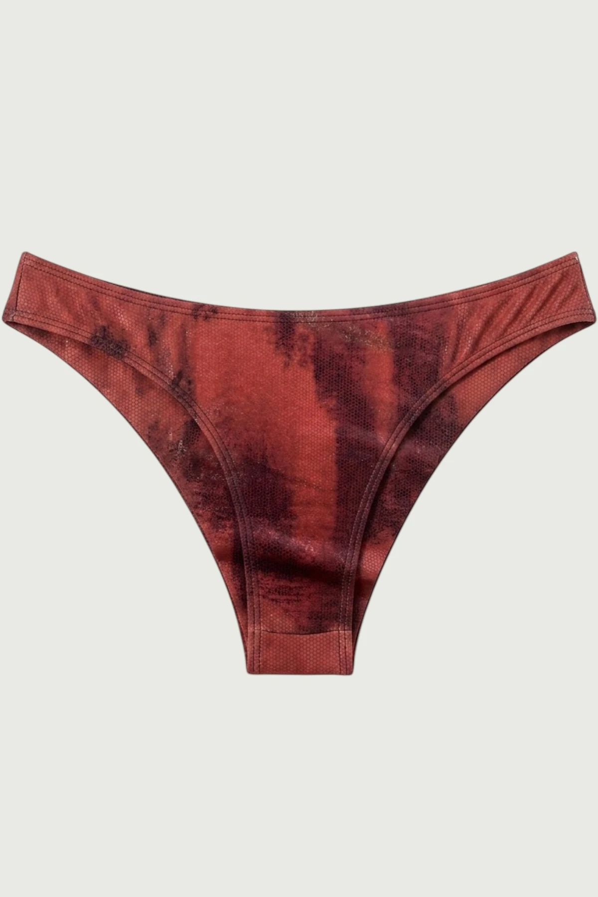 Cheecky bikini bottom in red reptile. made in house by Sartori Atelier in Barcelona